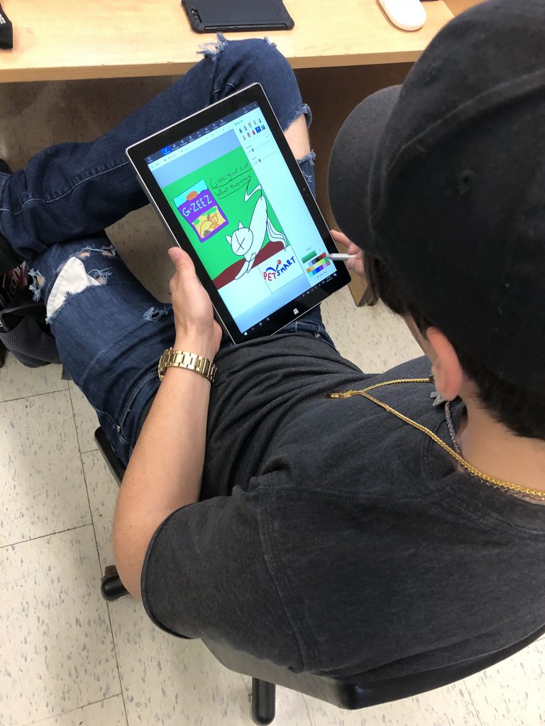 Student working on a tablet.